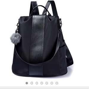 SOLD Waterproof backpack purse never used